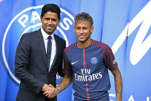 PARIS, FRANCE - AUGUST 04: Neymar poses with his new jersey next to Paris Saint-Germain President Nasser Al-Khelaifi after a press conference on August 4, 2017 in Paris, France. Neymar signed a 5 year contract for 222 Million Euro. (Photo by Aurelien Meunier/Getty Images) PARIS, FRANCE - AUGUST 04: Neymar poses with his new jersey next to Paris Saint-Germain President Nasser Al-Khelaifi after a press conference on August 4, 2017 in Paris, France. Neymar signed a 5 year contract for 222 Million Euro. (Photo by Aurelien Meunier/Getty Images)