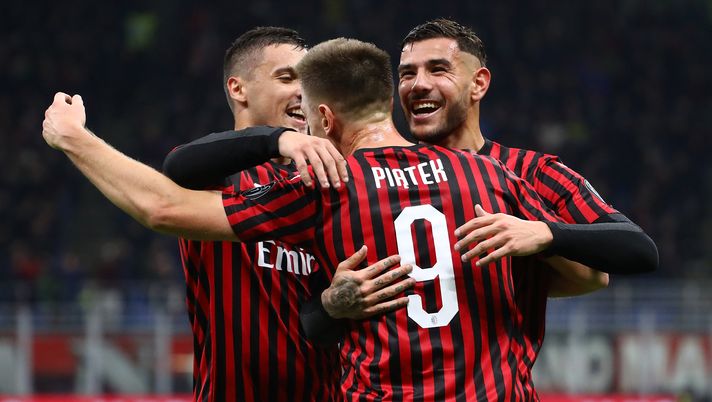 MILAN, ITALY - NOVEMBER 03:  Krzysztof Piatek (C) of AC Milan celebrates his goal with his team-mate Theo Hernandez (R) and Rade Krunic (L) during the Serie A match between AC Milan and SS Lazio at Stadio Giuseppe Meazza on November 3, 2019 in Milan, Italy.  (Photo by Marco Luzzani/Getty Images) 