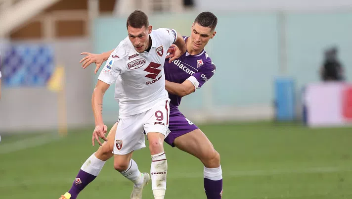 FLORENCE, ITALY - SEPTEMBER 19: Nikola Milenkovic of ACF Fiorentina battles for the ball with Andrea Belotti of Torino FC during the Serie A match between ACF Fiorentina and Torino FC at Stadio Artemio Franchi on September 19, 2020 in Florence, Italy.  (Photo by Gabriele Maltinti/Getty Images)