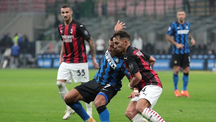 MILAN, ITALY - OCTOBER 17: Alexis Sanchez of FC Internazionale competes for the ball with Ismael Bennacer of AC Milan during the Serie A match between FC Internazionale and AC Milan at Stadio Giuseppe Meazza on October 17, 2020 in Milan, Italy. (Photo by Emilio Andreoli - Inter/Inter via Getty Images) MILAN, ITALY - OCTOBER 17: Alexis Sanchez of FC Internazionale competes for the ball with Ismael Bennacer of AC Milan during the Serie A match between FC Internazionale and AC Milan at Stadio Giuseppe Meazza on October 17, 2020 in Milan, Italy. (Photo by Emilio Andreoli - Inter/Inter via Getty Images)