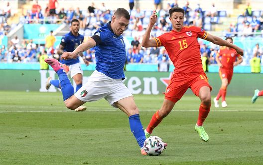 ROME, ITALY - JUNE 20: Andrea Belotti of Italy shoots whilst under pressure from Ethan Ampadu of Wales during the UEFA Euro 2020 Championship Group A match between Italy and Wales at Olimpico Stadium on June 20, 2021 in Rome, Italy. (Photo by Alberto Lingria - Pool/Getty Images) ROME, ITALY - JUNE 20: Andrea Belotti of Italy shoots whilst under pressure from Ethan Ampadu of Wales during the UEFA Euro 2020 Championship Group A match between Italy and Wales at Olimpico Stadium on June 20, 2021 in Rome, Italy. (Photo by Alberto Lingria - Pool/Getty Images)