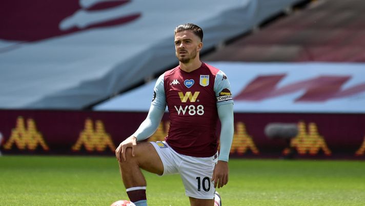 BIRMINGHAM, ENGLAND - JUNE 27: Jack Grealish of Aston Villa takes a knee in support of the Black Lives Matter movement during the Premier League match between Aston Villa and Wolverhampton Wanderers at Villa Park on June 27, 2020 in Birmingham, England. (Photo by Rui Vieira/Pool via Getty Images) 