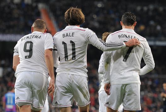 MADRID, SPAIN - MARCH 15: Gareth Bale of Real Madrid celebrates with Cristiano Ronaldo and Karim Benzema after scoring Real's opening goal during the La Liga match between Real Madrid CF and Levante UD at Estadio Santiago Bernabeu on March 15, 2015 in Madrid, Spain. (Photo by Denis Doyle/Getty Images) MADRID, SPAIN - MARCH 15: Gareth Bale of Real Madrid celebrates with Cristiano Ronaldo and Karim Benzema after scoring Real's opening goal during the La Liga match between Real Madrid CF and Levante UD at Estadio Santiago Bernabeu on March 15, 2015 in Madrid, Spain. (Photo by Denis Doyle/Getty Images)