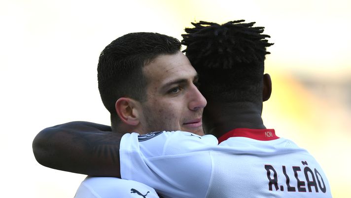 VERONA, ITALY - MARCH 07: Diogo Dalot of A.C. Milan celebrates with team mate Rafael Leao after scoring their side's second goal during the Serie A match between Hellas Verona FC and AC Milan at Stadio Marcantonio Bentegodi on March 07, 2021 in Verona, Italy. Sporting stadiums around Italy remain under strict restrictions due to the Coronavirus Pandemic as Government social distancing laws prohibit fans inside venues resulting in games being played behind closed doors. (Photo by Alessandro Sabattini/Getty Images) VERONA, ITALY - MARCH 07: Diogo Dalot of A.C. Milan celebrates with team mate Rafael Leao after scoring their side's second goal during the Serie A match between Hellas Verona FC and AC Milan at Stadio Marcantonio Bentegodi on March 07, 2021 in Verona, Italy. Sporting stadiums around Italy remain under strict restrictions due to the Coronavirus Pandemic as Government social distancing laws prohibit fans inside venues resulting in games being played behind closed doors. (Photo by Alessandro Sabattini/Getty Images)