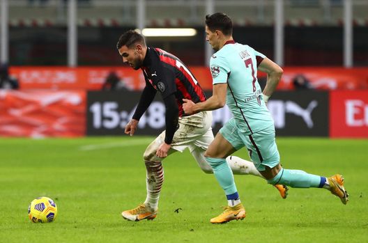 MILAN, ITALY - JANUARY 09: Theo Hernandez of A.C. Milan runs past Sasa Lukic of Torino F.C. during the Serie A match between AC Milan and Torino FC at Stadio Giuseppe Meazza on January 09, 2021 in Milan, Italy. Sporting stadiums around Italy remain under strict restrictions due to the Coronavirus Pandemic as Government social distancing laws prohibit fans inside venues resulting in games being played behind closed doors. (Photo by Marco Luzzani/Getty Images) MILAN, ITALY - JANUARY 09: Theo Hernandez of A.C. Milan runs past Sasa Lukic of Torino F.C. during the Serie A match between AC Milan and Torino FC at Stadio Giuseppe Meazza on January 09, 2021 in Milan, Italy. Sporting stadiums around Italy remain under strict restrictions due to the Coronavirus Pandemic as Government social distancing laws prohibit fans inside venues resulting in games being played behind closed doors. (Photo by Marco Luzzani/Getty Images)