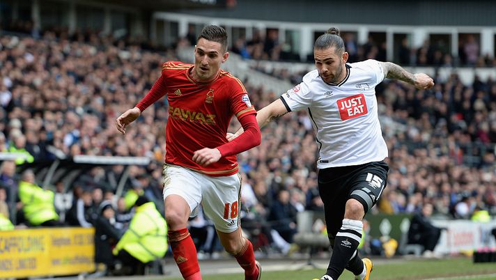 DERBY, ENGLAND - MARCH 19: Bradley Johnson of Derby County tackles Federico Macheda of Nottingham Forest during the Sky Bet Championship match between Derby County and Nottingham Forest at the iPro Stadium on March 19, 2016 in Derby, United Kingdom. (Photo by Tony Marshall/Getty Images) DERBY, ENGLAND - MARCH 19: Bradley Johnson of Derby County tackles Federico Macheda of Nottingham Forest during the Sky Bet Championship match between Derby County and Nottingham Forest at the iPro Stadium on March 19, 2016 in Derby, United Kingdom. (Photo by Tony Marshall/Getty Images)