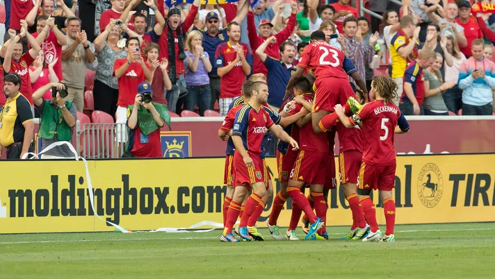 Aug 7, 2013; Sandy, UT, USA; Real Salt Lake players and fans celebrate a goal by Real Salt Lake forward Alvaro Saborio (15) during the first half of a U.S. Open Cup semi-final match against the Portland Timbers at Rio Tinto Stadium. Mandatory Credit: Russ Isabella-USA TODAY Sports