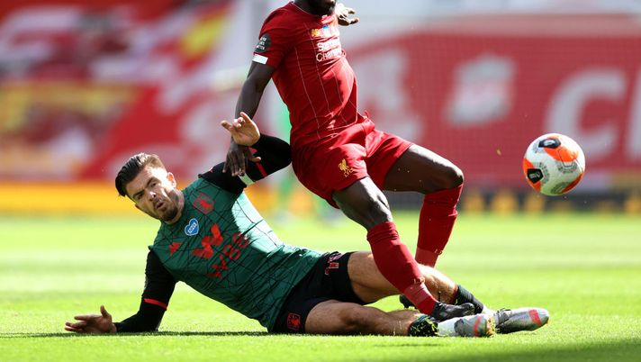 LIVERPOOL, ENGLAND - JULY 05: Jack Grealish of Aston Villa tackles Naby Keita of Liverpool during the Premier League match between Liverpool FC and Aston Villa at Anfield on July 05, 2020 in Liverpool, England.Football Stadiums around Europe remain empty due to the Coronavirus Pandemic as Government social distancing laws prohibit fans inside venues resulting in games being played behind closed doors. (Photo by Carl Recine/Pool via Getty Images) LIVERPOOL, ENGLAND - JULY 05: Jack Grealish of Aston Villa tackles Naby Keita of Liverpool during the Premier League match between Liverpool FC and Aston Villa at Anfield on July 05, 2020 in Liverpool, England.Football Stadiums around Europe remain empty due to the Coronavirus Pandemic as Government social distancing laws prohibit fans inside venues resulting in games being played behind closed doors. (Photo by Carl Recine/Pool via Getty Images)