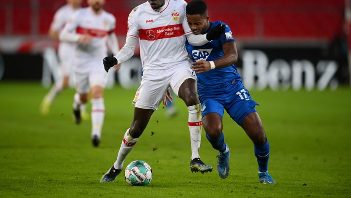 STUTTGART, GERMANY - MARCH 14: Silas Wamangituka of VfB Stuttgart battles for possession with Ryan Sessegnon of TSG 1899 Hoffenheim during the Bundesliga match between VfB Stuttgart and TSG Hoffenheim at Mercedes-Benz Arena on March 14, 2021 in Stuttgart, Germany. Sporting stadiums around Germany remain under strict restrictions due to the Coronavirus Pandemic as Government social distancing laws prohibit fans inside venues resulting in games being played behind closed doors. (Photo by Matthias Hangst/Getty Images) STUTTGART, GERMANY - MARCH 14: Silas Wamangituka of VfB Stuttgart battles for possession with Ryan Sessegnon of TSG 1899 Hoffenheim during the Bundesliga match between VfB Stuttgart and TSG Hoffenheim at Mercedes-Benz Arena on March 14, 2021 in Stuttgart, Germany. Sporting stadiums around Germany remain under strict restrictions due to the Coronavirus Pandemic as Government social distancing laws prohibit fans inside venues resulting in games being played behind closed doors. (Photo by Matthias Hangst/Getty Images)