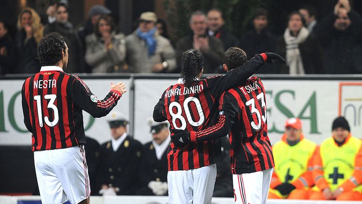 MILAN, ITALY - JANUARY 06: Alessandro Nesta, Ronaldinho and Thiago Silva of AC Milan celebrates with his team mates second goal scored by Thiago Silva during the Serie A match between AC Milan and Genoa CFC at Stadio Giuseppe Meazza on January 6, 2010 in Milan, Italy. (Photo by Massimo Cebrelli/Getty Images) MILAN, ITALY - JANUARY 06: Alessandro Nesta, Ronaldinho and Thiago Silva of AC Milan celebrates with his team mates second goal scored by Thiago Silva during the Serie A match between AC Milan and Genoa CFC at Stadio Giuseppe Meazza on January 6, 2010 in Milan, Italy. (Photo by Massimo Cebrelli/Getty Images)