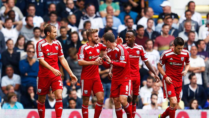 LONDON, ENGLAND - SEPTEMBER 21: James Morrison (2nd L) of West Brom celebrates with teammates after scoring the opening goal during the Barclays Premier League match between Tottenham Hotspur and West Bromwich Albion at White Hart Lane on September 21, 2014 in London, England. (Photo by Julian Finney/Getty Images) LONDON, ENGLAND - SEPTEMBER 21: James Morrison (2nd L) of West Brom celebrates with teammates after scoring the opening goal during the Barclays Premier League match between Tottenham Hotspur and West Bromwich Albion at White Hart Lane on September 21, 2014 in London, England. (Photo by Julian Finney/Getty Images)