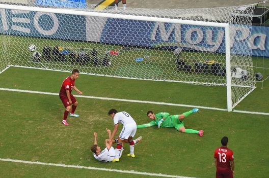 SALVADOR, BRAZIL - JUNE 16: Thomas Mueller of Germany scores his team's fourth goal and completes his hat trick past Rui Patricio of Portugal during the 2014 FIFA World Cup Brazil Group G match between Germany and Portugal at Arena Fonte Nova on June 16, 2014 in Salvador, Brazil. (Photo by Francois Xavier Marit - Pool/Getty Images) SALVADOR, BRAZIL - JUNE 16: Thomas Mueller of Germany scores his team's fourth goal and completes his hat trick past Rui Patricio of Portugal during the 2014 FIFA World Cup Brazil Group G match between Germany and Portugal at Arena Fonte Nova on June 16, 2014 in Salvador, Brazil. (Photo by Francois Xavier Marit - Pool/Getty Images)