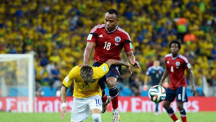 FORTALEZA, BRAZIL - JULY 04: Neymar of Brazil is challenged by Juan Camilo Zuniga of Colombia during the 2014 FIFA World Cup Brazil Quarter Final match between Brazil and Colombia at Castelao on July 4, 2014 in Fortaleza, Brazil. This tackle resulted in injury to Neymar and ended the player's World Cup. (Photo by Jamie McDonald/Getty Images) FORTALEZA, BRAZIL - JULY 04: Neymar of Brazil is challenged by Juan Camilo Zuniga of Colombia during the 2014 FIFA World Cup Brazil Quarter Final match between Brazil and Colombia at Castelao on July 4, 2014 in Fortaleza, Brazil. This tackle resulted in injury to Neymar and ended the player's World Cup. (Photo by Jamie McDonald/Getty Images)
