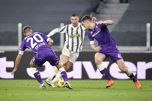 TURIN, ITALY - DECEMBER 22: Cristiano Ronaldo of Juventus competes for the ball with German Pezzella and Nikola Milenkovic of ACF Fiorentina during the Serie A match between Juventus and ACF Fiorentina at Allianz Stadium on December 22, 2020 in Turin, Italy. Sporting stadiums around Italy remain under strict restrictions due to the Coronavirus Pandemic as Government social distancing laws prohibit fans inside venues resulting in games being played behind closed doors. (Photo by Daniele Badolato - Juventus FC/Juventus FC via Getty Images) TURIN, ITALY - DECEMBER 22: Cristiano Ronaldo of Juventus competes for the ball with German Pezzella and Nikola Milenkovic of ACF Fiorentina during the Serie A match between Juventus and ACF Fiorentina at Allianz Stadium on December 22, 2020 in Turin, Italy. Sporting stadiums around Italy remain under strict restrictions due to the Coronavirus Pandemic as Government social distancing laws prohibit fans inside venues resulting in games being played behind closed doors. (Photo by Daniele Badolato - Juventus FC/Juventus FC via Getty Images)