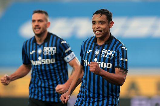 BERGAMO, ITALY - FEBRUARY 06: Luis Muriel of Atalanta B.C. celebrates after scoring their side's third goal during the Serie A match between Atalanta BC and Torino FC at Gewiss Stadium on February 06, 2021 in Bergamo, Italy. Sporting stadiums around Italy remain under strict restrictions due to the Coronavirus Pandemic as Government social distancing laws prohibit fans inside venues resulting in games being played behind closed doors. (Photo by Emilio Andreoli/Getty Images) BERGAMO, ITALY - FEBRUARY 06: Luis Muriel of Atalanta B.C. celebrates after scoring their side's third goal during the Serie A match between Atalanta BC and Torino FC at Gewiss Stadium on February 06, 2021 in Bergamo, Italy. Sporting stadiums around Italy remain under strict restrictions due to the Coronavirus Pandemic as Government social distancing laws prohibit fans inside venues resulting in games being played behind closed doors. (Photo by Emilio Andreoli/Getty Images)