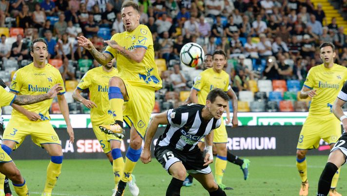UDINE, ITALY - AUGUST 20: Kevin Lasagna (R) of Udinese Calcio competes with Fabrizio Cacciatore of AC Chievo Verona during the Serie A match between Udinese Calcio and AC Chievo Verona at Friuli Stadium on August 20, 2017 in Udine, Italy. (Photo by Dino Panato/Getty Images) UDINE, ITALY - AUGUST 20: Kevin Lasagna (R) of Udinese Calcio competes with Fabrizio Cacciatore of AC Chievo Verona during the Serie A match between Udinese Calcio and AC Chievo Verona at Friuli Stadium on August 20, 2017 in Udine, Italy. (Photo by Dino Panato/Getty Images)