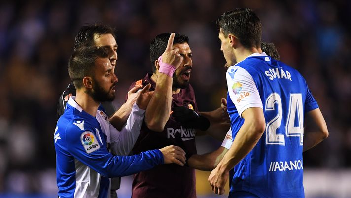 LA CORUNA, SPAIN - APRIL 29: Luis Suarez of Barcelona argues with Fabian Schaer of Deportivo La Coruna during the La Liga match between Deportivo La Coruna and Barcelona at Estadio Riazor on April 29, 2018 in La Coruna, Spain. (Photo by David Ramos/Getty Images) LA CORUNA, SPAIN - APRIL 29: Luis Suarez of Barcelona argues with Fabian Schaer of Deportivo La Coruna during the La Liga match between Deportivo La Coruna and Barcelona at Estadio Riazor on April 29, 2018 in La Coruna, Spain. (Photo by David Ramos/Getty Images)