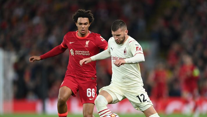 LIVERPOOL, ENGLAND - SEPTEMBER 15: Ante Rebic of AC Milan is challenged by Trent Alexander-Arnold of Liverpool during the UEFA Champions League group B match between Liverpool FC and AC Milan at Anfield on September 15, 2021 in Liverpool, England. (Photo by Shaun Botterill/Getty Images) 