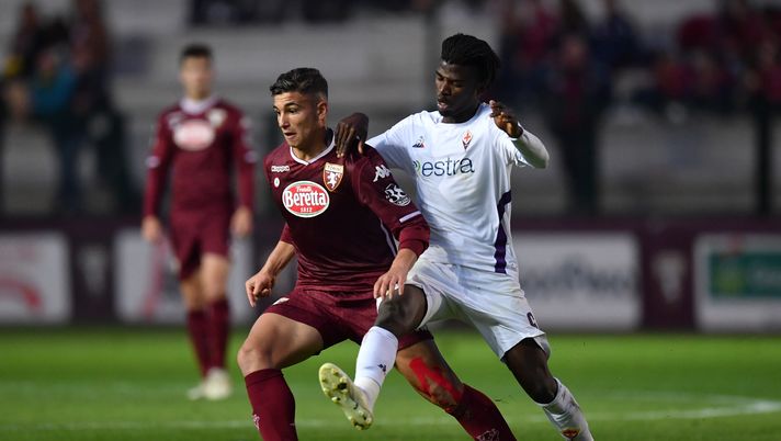 TURIN, ITALY - APRIL 12:  Nicola Rauti (L) of Torino FC U19 is challenged by Medja Beloko of ACF Fiorentina U19 during the Coppa Italia Primavera Final match between Torino FC U19 and ACF Fiorentina U19 on April 12, 2019 in Turin, Italy.  (Photo by Valerio Pennicino/Getty Images for Lega Serie A) 
