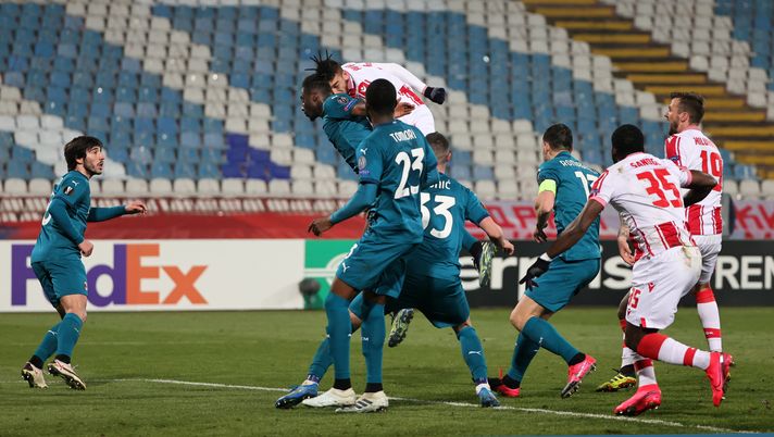 BELGRADE, SERBIA - FEBRUARY 18: Milan Pavkov of Crvena Zvezda scores their sides second goal during the UEFA Europa League Round of 32 match between Crvena Zvezda and AC Milan at Rajko Mitic Stadium on February 18, 2021 in Belgrade, Serbia. Sporting stadiums around Serbia remain under strict restrictions due to the Coronavirus Pandemic as Government social distancing laws prohibit fans inside venues resulting in games being played behind closed doors. (Photo by Srdjan Stevanovic/Getty Images) BELGRADE, SERBIA - FEBRUARY 18: Milan Pavkov of Crvena Zvezda scores their sides second goal during the UEFA Europa League Round of 32 match between Crvena Zvezda and AC Milan at Rajko Mitic Stadium on February 18, 2021 in Belgrade, Serbia. Sporting stadiums around Serbia remain under strict restrictions due to the Coronavirus Pandemic as Government social distancing laws prohibit fans inside venues resulting in games being played behind closed doors. (Photo by Srdjan Stevanovic/Getty Images)