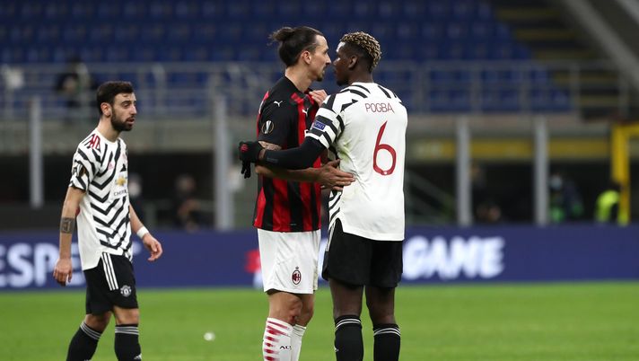 MILAN, ITALY - MARCH 18: Zlatan Ibrahimovic of AC Milan interacts with Paul Pogba of Manchester United following the UEFA Europa League Round of 16 Second Leg match between AC Milan and Manchester United at San Siro on March 18, 2021 in Milan, Italy. Sporting stadiums around Europe remain under strict restrictions due to the Coronavirus Pandemic as Government social distancing laws prohibit fans inside venues resulting in games being played behind closed doors. (Photo by Marco Luzzani/Getty Images) Un club che vede il futuro in una Nazione ancorata al passato - immagine 1