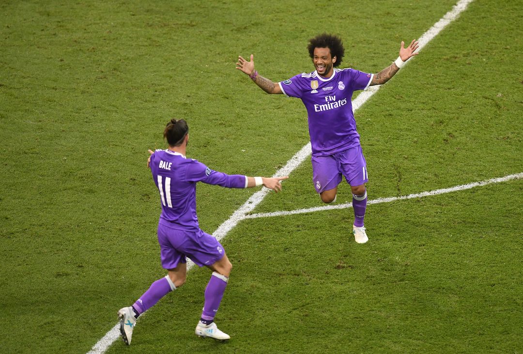  CARDIFF, WALES - JUNE 03:  Gareth Bale of Real Madrid and Marcelo of Real Madrid celebrate during the UEFA Champions League Final between Juventus and Real Madrid at National Stadium of Wales on June 3, 2017 in Cardiff, Wales.  (Photo by Michael Regan/Getty Images) 