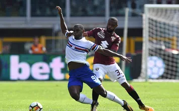  TURIN, ITALY - SEPTEMBER 17: Nicolas N koulou (R) of Torino FC tackles Duvan Esteban Zapata of UC Sampdoria during the Serie A match between Torino FC and UC Sampdoria at Stadio Olimpico di Torino on September 17, 2017 in Turin, Italy. (Photo by Valerio Pennicino/Getty Images)