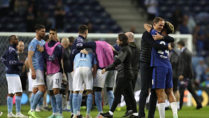 PORTO, PORTUGAL - MAY 29: Thomas Tuchel, Manager of Chelsea and Reece James of Chelsea embrace following their side's victory in the UEFA Champions League Final between Manchester City and Chelsea FC at Estadio do Dragao on May 29, 2021 in Porto, Portugal. (Photo by Manu Fernandez - Pool/Getty Images) PORTO, PORTUGAL - MAY 29: Thomas Tuchel, Manager of Chelsea and Reece James of Chelsea embrace following their side's victory in the UEFA Champions League Final between Manchester City and Chelsea FC at Estadio do Dragao on May 29, 2021 in Porto, Portugal. (Photo by Manu Fernandez - Pool/Getty Images)