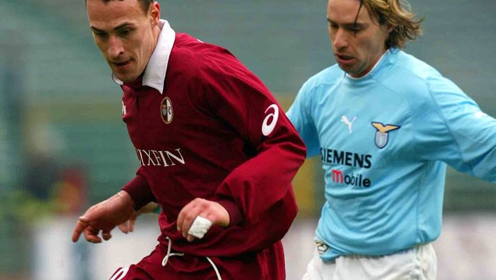ROME - FEBRUARY 9:  Luca Mezzano of Torino and Enrico Chiesa of Lazio in action during the Serie A match between Lazio and Torino, played at the Olympic Stadium, Rome, Italy on February, 2003.  (Photo by Grazia Neri/Getty Images) 