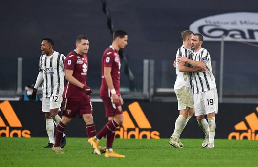 TURIN, ITALY - DECEMBER 05: Matthijs De Ligt and Leonardo Bonucci of Juventus celebrate their sides victory after the Serie A match between Juventus and Torino FC at Allianz Stadium on December 05, 2020 in Turin, Italy. Football Stadiums around Italy remain empty due to the Coronavirus Pandemic as Government social distancing laws prohibit fans inside venues resulting in fixtures being played behind closed doors. (Photo by Valerio Pennicino/Getty Images) TURIN, ITALY - DECEMBER 05: Matthijs De Ligt and Leonardo Bonucci of Juventus celebrate their sides victory after the Serie A match between Juventus and Torino FC at Allianz Stadium on December 05, 2020 in Turin, Italy. Football Stadiums around Italy remain empty due to the Coronavirus Pandemic as Government social distancing laws prohibit fans inside venues resulting in fixtures being played behind closed doors. (Photo by Valerio Pennicino/Getty Images)