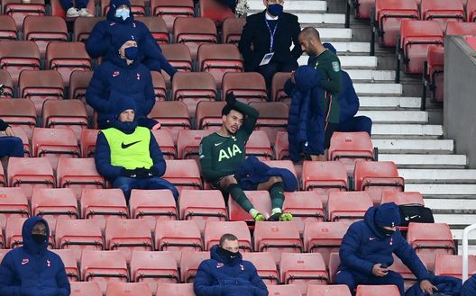 STOKE ON TRENT, ENGLAND - DECEMBER 23: Dele Alli of Tottenham Hotspur reacts as he takes his seat in the stands after being substituted off during the Carabao Cup Quarter Final match between Stoke City and Tottenham Hotspur at Bet365 Stadium on December 23, 2020 in Stoke on Trent, England. The match will be played without fans, behind closed doors as a Covid-19 precaution. (Photo by Michael Regan/Getty Images) STOKE ON TRENT, ENGLAND - DECEMBER 23: Dele Alli of Tottenham Hotspur reacts as he takes his seat in the stands after being substituted off during the Carabao Cup Quarter Final match between Stoke City and Tottenham Hotspur at Bet365 Stadium on December 23, 2020 in Stoke on Trent, England. The match will be played without fans, behind closed doors as a Covid-19 precaution. (Photo by Michael Regan/Getty Images)