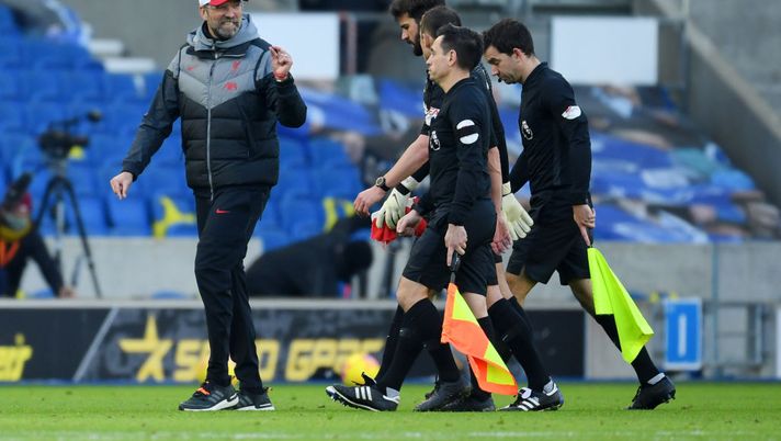 BRIGHTON, ENGLAND - NOVEMBER 28: Jurgen Klopp, Manager of Liverpool talks to referee Stuart Attwell after the Premier League match between Brighton & Hove Albion and Liverpool at American Express Community Stadium on November 28, 2020 in Brighton, England. Sporting stadiums around the UK remain under strict restrictions due to the Coronavirus Pandemic as Government social distancing laws prohibit fans inside venues resulting in games being played behind closed doors. (Photo by Mike Hewitt/Getty Images) BRIGHTON, ENGLAND - NOVEMBER 28: Jurgen Klopp, Manager of Liverpool talks to referee Stuart Attwell after the Premier League match between Brighton & Hove Albion and Liverpool at American Express Community Stadium on November 28, 2020 in Brighton, England. Sporting stadiums around the UK remain under strict restrictions due to the Coronavirus Pandemic as Government social distancing laws prohibit fans inside venues resulting in games being played behind closed doors. (Photo by Mike Hewitt/Getty Images)