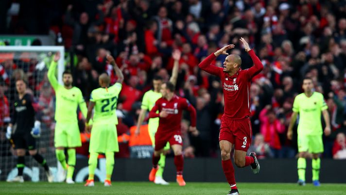 LIVERPOOL, ENGLAND - MAY 07: Fabinho of Liverpool celebrates to the crowd after his team mate Divock Origi has scored the first goal during the UEFA Champions League Semi Final second leg match between Liverpool and Barcelona at Anfield on May 07, 2019 in Liverpool, England. (Photo by Clive Brunskill/Getty Images) LIVERPOOL, ENGLAND - MAY 07: Fabinho of Liverpool celebrates to the crowd after his team mate Divock Origi has scored the first goal during the UEFA Champions League Semi Final second leg match between Liverpool and Barcelona at Anfield on May 07, 2019 in Liverpool, England. (Photo by Clive Brunskill/Getty Images)