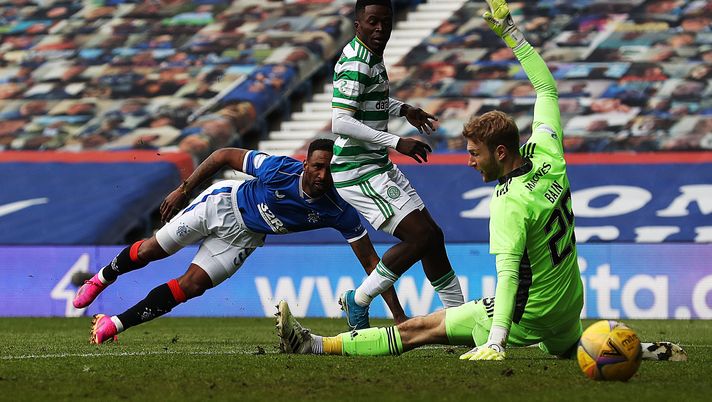 GLASGOW, SCOTLAND - MAY 02: Jermain Defoe of Rangers scores his team's fourth goal during the Ladbrokes Scottish Premiership match between Rangers and Celtic at Ibrox Stadium on May 02, 2021 in Glasgow, Scotland. Sporting stadiums around the UK remain under strict restrictions due to the Coronavirus Pandemic as Government social distancing laws prohibit fans inside venues resulting in games being played behind closed doors. (Photo by Ian MacNicol/Getty Images) GLASGOW, SCOTLAND - MAY 02: Jermain Defoe of Rangers scores his team's fourth goal during the Ladbrokes Scottish Premiership match between Rangers and Celtic at Ibrox Stadium on May 02, 2021 in Glasgow, Scotland. Sporting stadiums around the UK remain under strict restrictions due to the Coronavirus Pandemic as Government social distancing laws prohibit fans inside venues resulting in games being played behind closed doors. (Photo by Ian MacNicol/Getty Images)