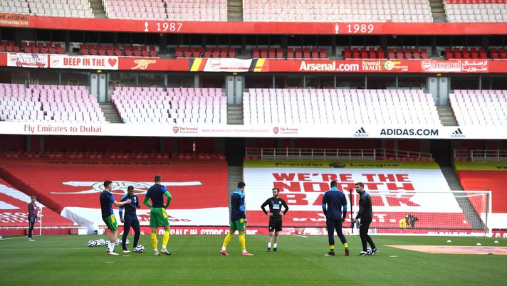LONDON, ENGLAND - MAY 09: A general view inside the stadium as players of West Bromwich Albion prior to the Premier League match between Arsenal and West Bromwich Albion at Emirates Stadium on May 09, 2021 in London, England. Sporting stadiums around the UK remain under strict restrictions due to the Coronavirus Pandemic as Government social distancing laws prohibit fans inside venues resulting in games being played behind closed doors. (Photo by Andy Rain - Pool/Getty Images) LONDON, ENGLAND - MAY 09: A general view inside the stadium as players of West Bromwich Albion prior to the Premier League match between Arsenal and West Bromwich Albion at Emirates Stadium on May 09, 2021 in London, England. Sporting stadiums around the UK remain under strict restrictions due to the Coronavirus Pandemic as Government social distancing laws prohibit fans inside venues resulting in games being played behind closed doors. (Photo by Andy Rain - Pool/Getty Images)