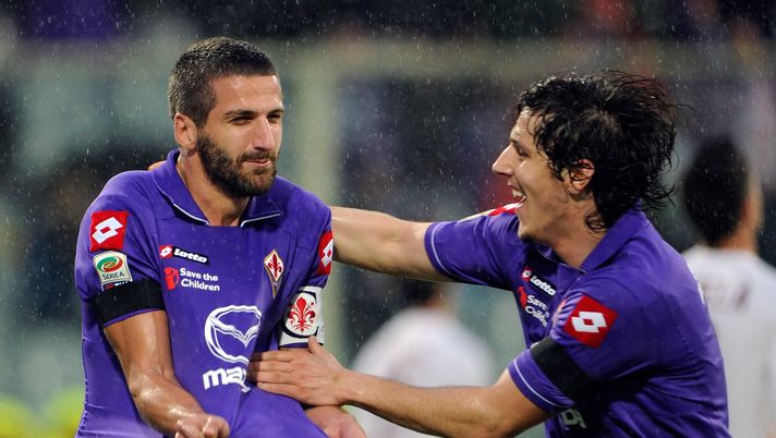 FLORENCE, ITALY - DECEMBER 04: Alessandro Gamberini of ACF Fiorentina celebrates with team-mate Stevan Jovetic after scoring the second goal during the Serie A match between ACF Fiorentina and AS Roma at Stadio Artemio Franchi on December 4, 2011 in Florence, Italy. (Photo by Claudio Villa/Getty Images) FLORENCE, ITALY - DECEMBER 04: Alessandro Gamberini of ACF Fiorentina celebrates with team-mate Stevan Jovetic after scoring the second goal during the Serie A match between ACF Fiorentina and AS Roma at Stadio Artemio Franchi on December 4, 2011 in Florence, Italy. (Photo by Claudio Villa/Getty Images)
