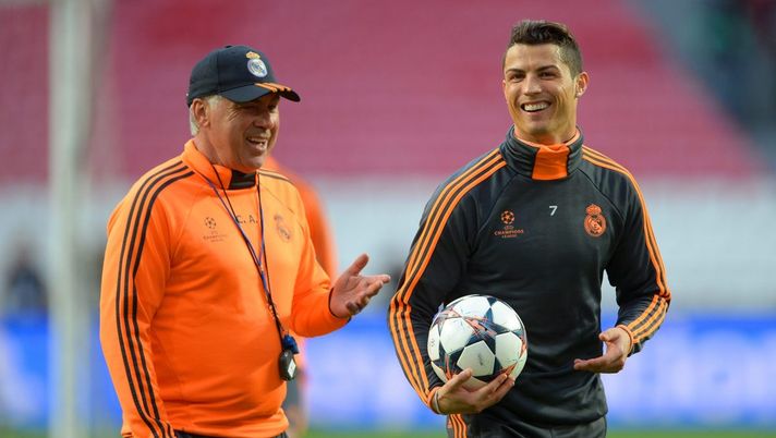LISBON, PORTUGAL - MAY 23: Head Coach, Carlo Ancelotti of Real Madrid shares a joke with Cristiano Ronaldo of Real Madrid during a Real Madrid training session ahead of the UEFA Champions League Final against Club Atletico de Madrid at Estadio da Luz on May 23, 2014 in Lisbon, Portugal. (Photo by Michael Regan/Getty Images) LISBON, PORTUGAL - MAY 23: Head Coach, Carlo Ancelotti of Real Madrid shares a joke with Cristiano Ronaldo of Real Madrid during a Real Madrid training session ahead of the UEFA Champions League Final against Club Atletico de Madrid at Estadio da Luz on May 23, 2014 in Lisbon, Portugal. (Photo by Michael Regan/Getty Images)