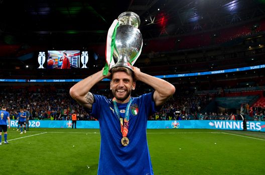 LONDON, ENGLAND - JULY 11: Domenico Berardi of Italy celebrates with The Henri Delaunay Trophy following his team's victory in the UEFA Euro 2020 Championship Final between Italy and England at Wembley Stadium on July 11, 2021 in London, England. (Photo by Claudio Villa/Getty Images) LONDON, ENGLAND - JULY 11: Domenico Berardi of Italy celebrates with The Henri Delaunay Trophy following his team's victory in the UEFA Euro 2020 Championship Final between Italy and England at Wembley Stadium on July 11, 2021 in London, England. (Photo by Claudio Villa/Getty Images)