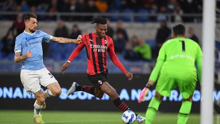 ROME, ITALY - APRIL 24: Rafael Leao of AC Milan competes for the ball with Francesco Acerbi of SS Lazio during the Serie A match between SS Lazio and AC Milan at Stadio Olimpico on April 24, 2022 in Rome, Italy. (Photo by Claudio Villa/AC Milan via Getty Images)