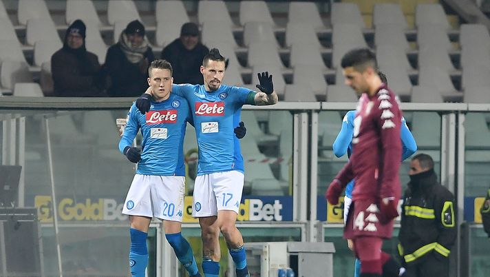 TURIN, ITALY - DECEMBER 16: Marek Hamsik and Piotr Zielinski of SSC Napoli celebrate the 0-2 goal scored by Piotr Zielinski, beside the disappointment of Iago Falquei player of Torino FC during the Serie A match between Torino FC and SSC Napoli at Stadio Olimpico di Torino on December 16, 2017 in Turin, Italy. (Photo by Francesco Pecoraro/Getty Images) TURIN, ITALY - DECEMBER 16: Marek Hamsik and Piotr Zielinski of SSC Napoli celebrate the 0-2 goal scored by Piotr Zielinski, beside the disappointment of Iago Falquei player of Torino FC during the Serie A match between Torino FC and SSC Napoli at Stadio Olimpico di Torino on December 16, 2017 in Turin, Italy. (Photo by Francesco Pecoraro/Getty Images)
