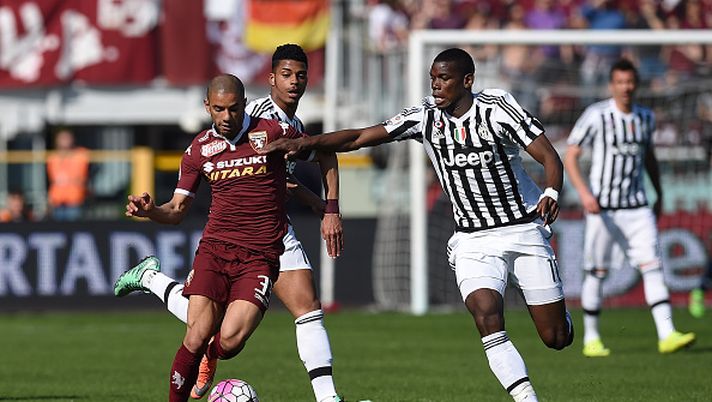 TURIN, ITALY - MARCH 20: Bruno Peres (L) of Torino FC competes with Paul Pogba of Juventus FC during the Serie A match between Torino FC and Juventus FC at Stadio Olimpico di Torino on March 20, 2016 in Turin, Italy. (Photo by Valerio Pennicino/Getty Images) Torino, Bruno Peres: “Il gol alla Juve nel derby il più bello della mia carriera” - immagine 1