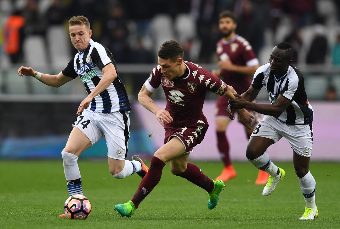  TURIN, ITALY - APRIL 02:  Andrea Belotti (C) of FC Torino is challenged by Emmanuel Badu (R) of Udinese Calcio during the Serie A match between FC Torino and Udinese Calcio at Stadio Olimpico di Torino on April 2, 2017 in Turin, Italy.  (Photo by Valerio Pennicino/Getty Images) 