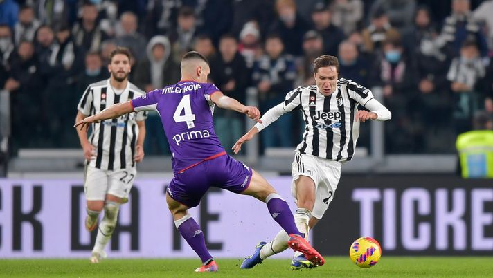 TURIN, ITALY - NOVEMBER 06: Federico Chiesa of Juventus is challenged by Nikola Milenkovic of ACF Fiorentina during the Serie A match between Juventus FC and ACF Fiorentina at Allianz Stadium on November 06, 2021 in Turin, Italy. (Photo by Daniele Badolato - Juventus FC/Juventus FC via Getty Images) TURIN, ITALY - NOVEMBER 06: Federico Chiesa of Juventus is challenged by Nikola Milenkovic of ACF Fiorentina during the Serie A match between Juventus FC and ACF Fiorentina at Allianz Stadium on November 06, 2021 in Turin, Italy. (Photo by Daniele Badolato - Juventus FC/Juventus FC via Getty Images)