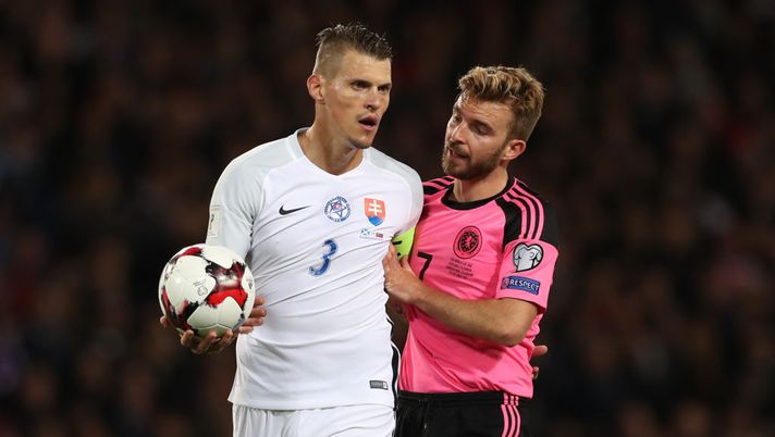 GLASGOW, SCOTLAND - OCTOBER 05: Martin Skrtel of Slovakia  and James Morrison of Scotland are seen during the FIFA 2018 World Cup Qualifier between Scotland and Slovakia at Hampden Park on October 5, 2017 in Glasgow, Scotland. (Photo by Ian MacNicol/Getty Images) 