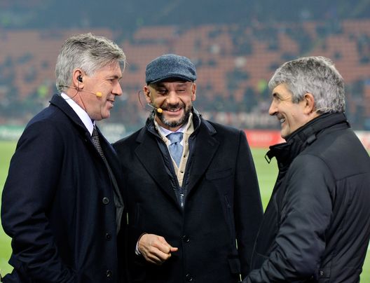 MILAN, ITALY - NOVEMBER 23: (L-R) Carlo Ancelotti, Gianluca Vialli and Paolo Rossi talk before the UEFA Champions League group H match between AC Milan and FC Barcelona at Giuseppe Meazza Stadium on November 23, 2011 in Milan, Italy. (Photo by Claudio Villa/Getty Images) MILAN, ITALY - NOVEMBER 23: (L-R) Carlo Ancelotti, Gianluca Vialli and Paolo Rossi talk before the UEFA Champions League group H match between AC Milan and FC Barcelona at Giuseppe Meazza Stadium on November 23, 2011 in Milan, Italy. (Photo by Claudio Villa/Getty Images)