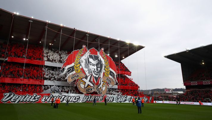 LIEGE, BELGIUM - FEBRUARY 19: The fans of Standard Liege hold up large flags and signs with Ultras Inferno as well as the devil team logo during the Belgian Jupiler Pro League match between Royal Standard de Liege and KAA Gent held at Stade Maurice Dufrasne on February 19, 2017 in Liege, Belgium. (Photo by Dean Mouhtaropoulos/Getty Images) LIEGE, BELGIUM - FEBRUARY 19: The fans of Standard Liege hold up large flags and signs with Ultras Inferno as well as the devil team logo during the Belgian Jupiler Pro League match between Royal Standard de Liege and KAA Gent held at Stade Maurice Dufrasne on February 19, 2017 in Liege, Belgium. (Photo by Dean Mouhtaropoulos/Getty Images)