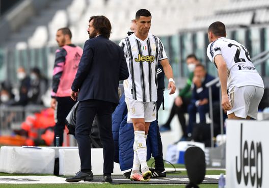 TURIN, ITALY - MAY 15: Andrea Pirlo, Head Coach of Juventus interacts with Cristiano Ronaldo of Juventus after he is substituted during the Serie A match between Juventus and FC Internazionale at Allianz Stadium on May 15, 2021 in Turin, Italy. Sporting stadiums around Italy remain under strict restrictions due to the Coronavirus Pandemic as Government social distancing laws prohibit fans inside venues resulting in games being played behind closed doors. (Photo by Valerio Pennicino/Getty Images) TURIN, ITALY - MAY 15: Andrea Pirlo, Head Coach of Juventus interacts with Cristiano Ronaldo of Juventus after he is substituted during the Serie A match between Juventus and FC Internazionale at Allianz Stadium on May 15, 2021 in Turin, Italy. Sporting stadiums around Italy remain under strict restrictions due to the Coronavirus Pandemic as Government social distancing laws prohibit fans inside venues resulting in games being played behind closed doors. (Photo by Valerio Pennicino/Getty Images)