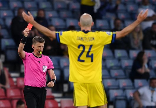 GLASGOW, SCOTLAND - JUNE 29: Match Referee, Daniele Orsato shows a red card to Marcus Danielson of Sweden after a VAR review during the UEFA Euro 2020 Championship Round of 16 match between Sweden and Ukraine at Hampden Park on June 29, 2021 in Glasgow, Scotland. (Photo by Stu Forster/Getty Images) GLASGOW, SCOTLAND - JUNE 29: Match Referee, Daniele Orsato shows a red card to Marcus Danielson of Sweden after a VAR review during the UEFA Euro 2020 Championship Round of 16 match between Sweden and Ukraine at Hampden Park on June 29, 2021 in Glasgow, Scotland. (Photo by Stu Forster/Getty Images)