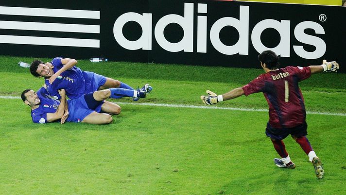 DORTMUND, GERMANY - JULY 04: Fabio Grosso of Italy celebrates scoring his team's first goal in extra time with team mates Gianluca Zambrotta and Gianluigi Buffon (R) during the FIFA World Cup Germany 2006 Semi-final match between Germany and Italy played at the Stadium Dortmund on July 04, 2006 in Dortmund, Germany. (Photo by Martin Rose/Bongarts/Getty Images) DORTMUND, GERMANY - JULY 04: Fabio Grosso of Italy celebrates scoring his team's first goal in extra time with team mates Gianluca Zambrotta and Gianluigi Buffon (R) during the FIFA World Cup Germany 2006 Semi-final match between Germany and Italy played at the Stadium Dortmund on July 04, 2006 in Dortmund, Germany. (Photo by Martin Rose/Bongarts/Getty Images)