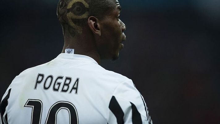 Juventus' midfielder from France Paul Pogba raects during the UEFA Champions League, Round of 16, second leg football match FC Bayern Munich v Juventus in Munich, southern Germany on March 16, 2016. / AFP / ODD ANDERSEN (Photo credit should read ODD ANDERSEN/AFP via Getty Images) Pogba: “La Juve è tutto per me! Sono tornato e sono felice, lo sarò ancora di più con lo Scudetto” - immagine 1